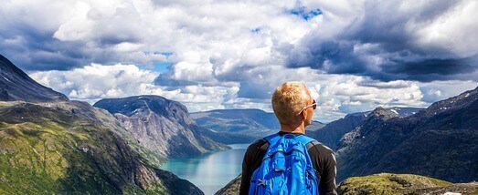 Mountain climber looking at the landscape